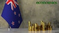 Piles of gold coins on a marble table against the background of the flag of New Zealand.