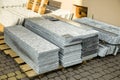 Piles of granite marble slabs. Stone sheets for decorative construction