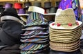 Piles of Hats on Display in a Shop