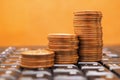 Piles of Japanese 10 yen coins are on the black keyboard of a computer or laptop. Online trading, payments and remote work. Macro Royalty Free Stock Photo