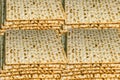 Piles of Jewish Matzah bread, substitute for bread on the Jewish Passover holiday. Pesach matzo background Royalty Free Stock Photo