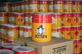 Piles of Jotun brand paint cans.