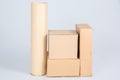 Piles of many cardboard boxes and tube on a white background Royalty Free Stock Photo