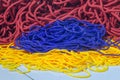 piles and mounds of yellow, red, blue rope