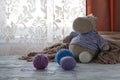 Piles of multi-colored colorful balls from wool on with small to