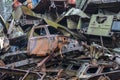 Piles of old cars in scrap metal yard ready for recycling Royalty Free Stock Photo