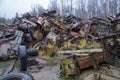 Piles of old rusty soviet crushed trucks in scrap metal yard Royalty Free Stock Photo