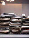 Piles of papers and files on the table in the room Royalty Free Stock Photo