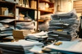 Piles of paperwork and folders in office room. The concept of workaholism, an emergency at work Royalty Free Stock Photo
