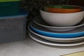 Piles of plates and glasses in the kitchen of an apartment