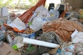 Piles of rubbish and rags in an homeless camp after the forced e