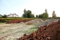 Piles of sand. A heap of building material for bedding or an ingredient for mixing cement. Construction site. Large delivery.