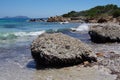 Piles of seaweeds on the beach in Sardinia.