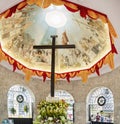 Piles of small wax candles,inside The Cross Of Magellan Pavillion,surrounding the cruxifix planted in Cebu by explorers,in 16th Royalty Free Stock Photo