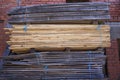 Piles stack of timber on construction site Royalty Free Stock Photo