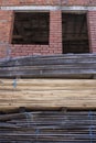 Piles stack of timber on construction site Royalty Free Stock Photo