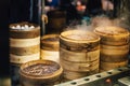 Piles of stacking bamboo steamers are steaming for dim sum. Street food of Jiantan in Taipei, Taiwan Royalty Free Stock Photo