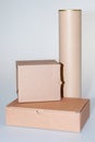 Piles of three cardboard boxes on grey white background Royalty Free Stock Photo