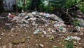 Background of garbage. Piles of undecomposed garbage. Plastic garbage fills the yard. The concept of environmental pollution Royalty Free Stock Photo