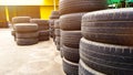 Piles of used car tires at a car maintenance garage Royalty Free Stock Photo