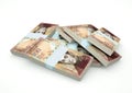 Piles of Venezuela money isolated on white background