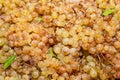 Piles of white chasselas grapes