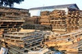 piles of wooden pallets, for industrial needs as a medium for packing goods Royalty Free Stock Photo