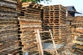 piles of wooden pallets, for industrial needs as a medium for packing goods Royalty Free Stock Photo