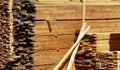 Piles of wooden plank, timber beams, rods and logs Royalty Free Stock Photo