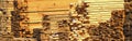 Piles of wooden plank, timber beams, rods and logs Royalty Free Stock Photo