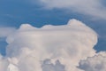 Pileus cap on top of cumulus clouds, white cumulus clouds Royalty Free Stock Photo