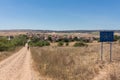 Pilgrim arriving in AgÃÂ©s, a small city along the Camino de Santiago Saint James Way. Castilla y Leon, Spain.