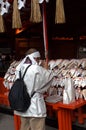 Pilgrim at Fushimi Inari Temple, Kyoto, Japan