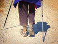 A pilgrim`s walk on hard stage in Palencia, Way of St. James, Spain