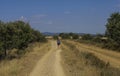 Pilgrim walking alone in the Camino de Santiago The Way of Saint James, Leon, Spain.