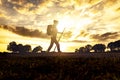 Pilgrim woman at Sunset