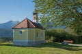Pilgrimage chapel and bench in the bavarian alps