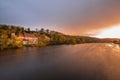 Pilgrimage church Mariaort and the river Naab near Regensburg during a dramatic sunset and clouds after a thunderstorm storm, Germ Royalty Free Stock Photo