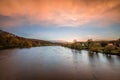 Pilgrimage church Mariaort and the river Naab near Regensburg during a dramatic sunset and clouds after a thunderstorm storm, Germ Royalty Free Stock Photo