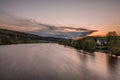 Pilgrimage church Mariaort and the river Naab near Regensburg during a dramatic sunset and clouds after a thunderstorm storm, Germ Royalty Free Stock Photo