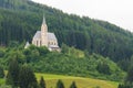 Pilgrimage Church Saint Leonhard surrounded by the forest, Tamsweg, Austria Royalty Free Stock Photo