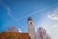 Pilgrimage Church Wallfahrtskirche Heiligenstatt in Tussling, Germany. Airplane contrails on blue sky