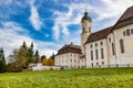 Pilgrimage Church Wieskirche with clody blue sky and green lawn in Bavaria Royalty Free Stock Photo