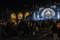 Pilgrims attend the Marian Torchlight Procession service at the Rosary Basilica in Lourdes Royalty Free Stock Photo