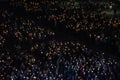 Pilgrims attend the Marian Torchlight Procession service at the Rosary Basilica in Lourdes Royalty Free Stock Photo