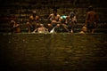 Pilgrims bathe and wash in the holy waters of the Ganges, Varanasi, India