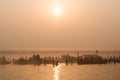 Pilgrims Bathing in the Ganges at Sunrise, Varanasi, India Royalty Free Stock Photo