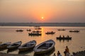 Pilgrims on boat floating on the waters of sacred river Ganges early morning. Royalty Free Stock Photo