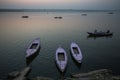 Pilgrims on boat floating on the waters of sacred river Ganges early morning. Royalty Free Stock Photo