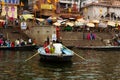 pilgrims in boats on the sacred river Ganges